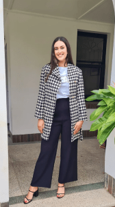 Accolade Herringbone Coat in a classic black-and-white houndstooth pattern, creating a sophisticated and modern look