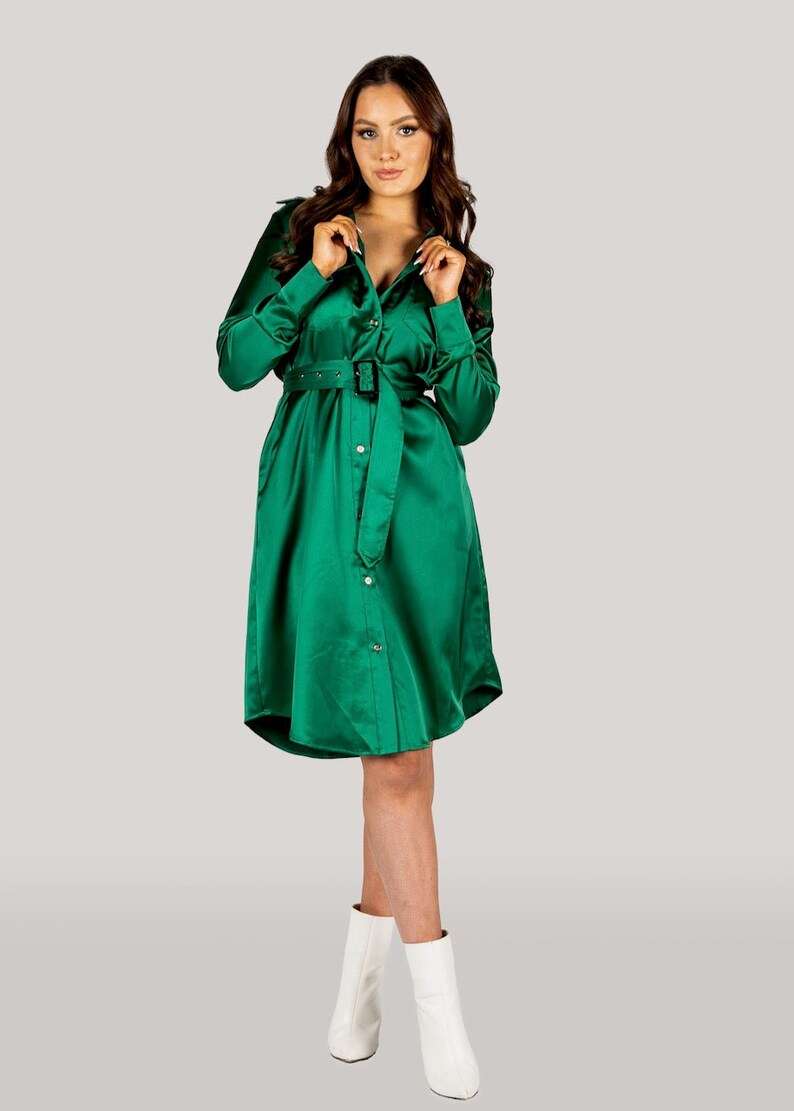Emerald green satin belted dress: Sleek and luxurious design with a tailored waist for a sophisticated, Australian-made touch.